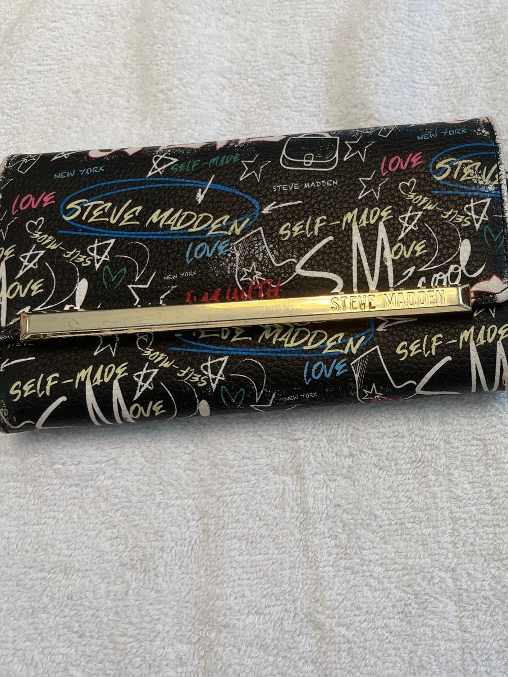 Steve Madden Black Graffiti Print Wristlet with Gold Hardware